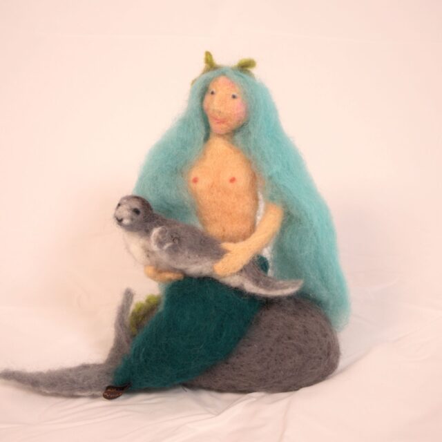 Sjöjungfru med säl